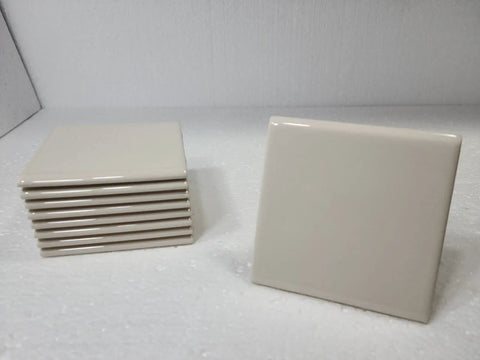 Beige Bone Almond Ceramic Bullnose Tile 4x4 Square Trim With Curved Edge 9 Piece Box Classic Color 006 displayed at angle