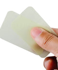 Close-up of fingers holding On The Go Hand Soap Sheets For Travel And Outdoors, 100 Sheets Biodegradable Plant Based Wash