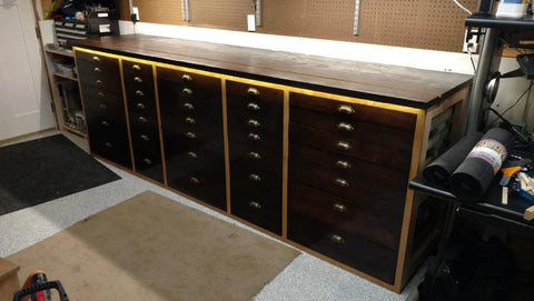 Workshop cabinets with bronze shell-shaped knobs; ideal for adding vintage style with Antique Bronze Iron Drawer Knob Set 10 Pack Vintage Cabinet Pulls.