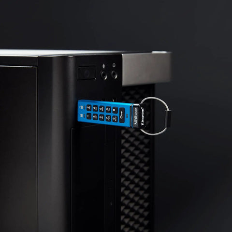 Rock Solid 16Gb Encrypted Usb Drive With Alphanumeric Keypad Lock inserted in a computer, featuring a sleek blue design.