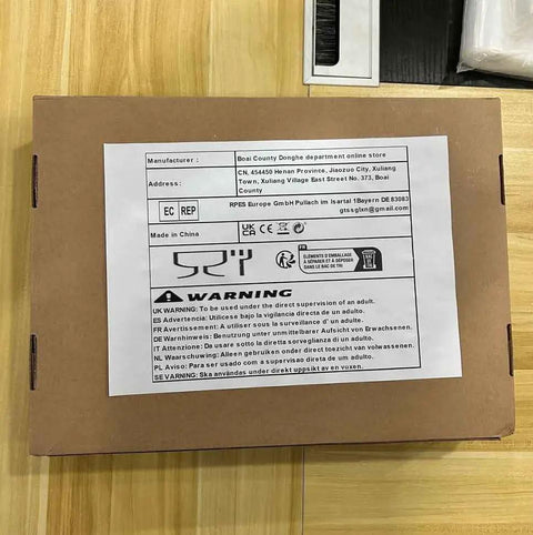 Packaging for Tangle Free Grab And Go Heavy Duty Retractable Coiled Extension Cord showing manufacturer and warning labels.