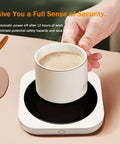 Smart Desk Electric Coffee Mug Warmer With Three Adjustable Heat Settings And Twelve Hour Auto Shut Off, cup on warmer.