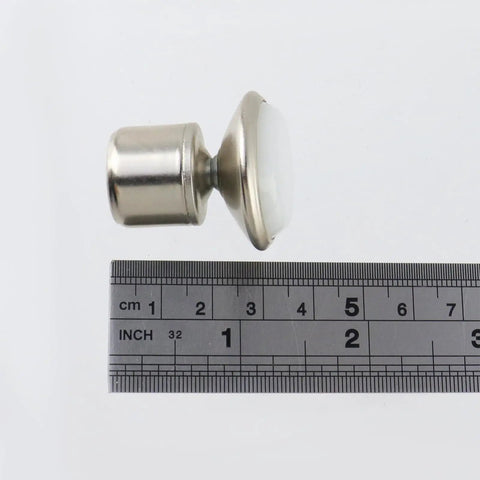 Five Eighth Inch Swivel Glides For Cabinets Tables And Chairs Pack Of 12 Durable Nickel Plated Metal Construction next to ruler