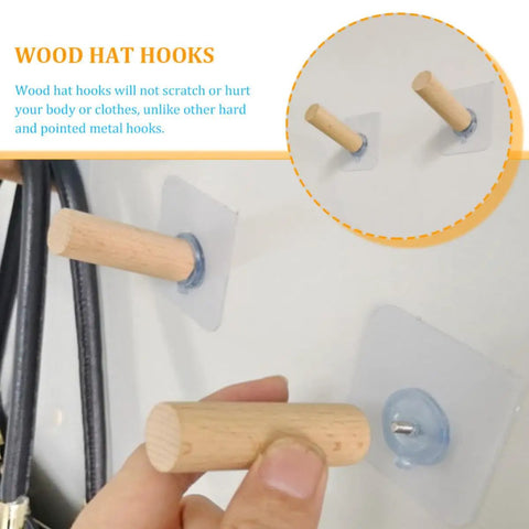 6 Piece Extra Long Wooden Wall Hooks Self Adhesive Coat Rack For Doors Easy Peel Stick mounted on wall with hands holding a hook.