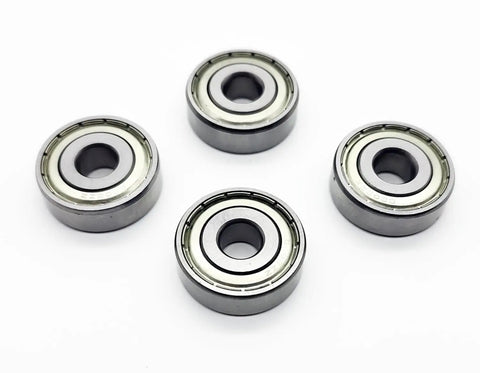 Get A Buttery Smooth Ride With These Heavy Duty Wheelchair Rear Bearings 4 Pack Universal 11mm showing four sealed bearings on white background.