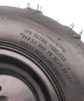 Side view of 7 Inch Right Wheel Rim Tire Assembly For ATVs And Go Karts Fits 50cc 90cc 110cc 125cc Includes 16x8-7 Tire
