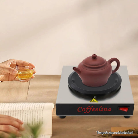 Keep Your Morning Brew Piping Hot With This Rugged Stainless Steel Coffee Warmer Plate Featuring Auto Shut Off And Sturdy Grip Base built for teapots on a wooden table.