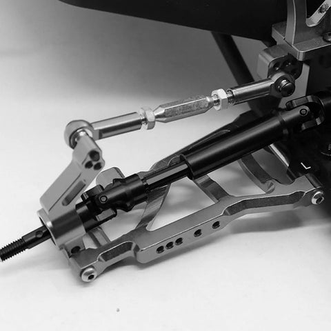 Upgraded CVD Rear Drive Shafts For Off Road RC Trucks detailed view of black steel axle connection and alloy adapter, showcasing smooth handling.