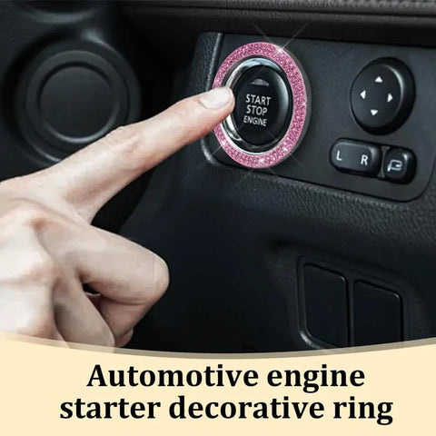 Finger pressing car start button with pink decorative ring, automotive engine starter add-on