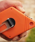 Person holding Octagonal Chalk Line Reel With Heavy Duty Steel Crank 100 Foot Line 1.5 mm String Self Sealing Grommet