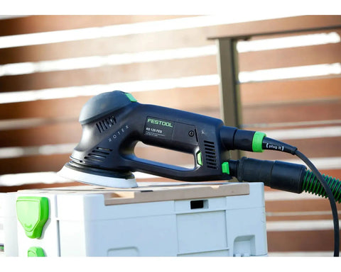 Rotex RO 125 FEQ-Plus Random Orbital Sander With Gear Driven Aggressive Mode And Jetstream Dust Extraction in action outdoors