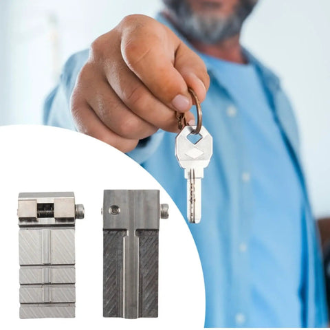 Thinking Process: stainless steel key fixture clamp, 16.9x54.1mm, shown holding a key for locksmith cutting