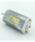Heavy Duty DC 120V Electric Motor With Beefy Torque Output Runs Ultra Smooth Low Noise Design Built Like A Tank With Dust Resistant Housing For Non Stop Industrial Grind, showing metal casing and wire connections.
