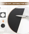 Close-up of scissors cutting black Six Pack Adhesive Neoprene Foam Sheets One Eighth Inch Thick Twelve By Eight Inch for DIY projects.