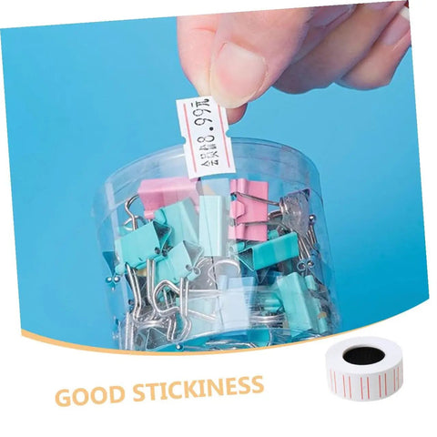 Hand applying 4000 Pcs Small Pricing Labels On Rolls to container with binder clips, showcasing self-adhesive feature.
