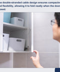 16 Inch Stainless Steel Braided Cabinet Door Restraint Cable Kit With Eyelets, Flexible Hinge Limiter For Chest, Cupboard And Closet Doors, 10 Pack Keeps Cabinets From Slamming, Easy Install And Smooth Door Action. cabinet door cable limiter on open white cupboard