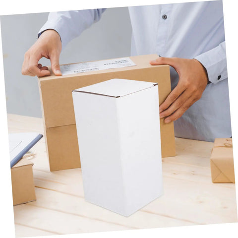 Person handling White Corrugated Small Mailer Boxes Pack 10 Lightweight Shipping Boxes For Packaging And Mailing