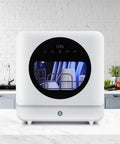 Hella Compact Countertop Dishwasher With Built In Five Liter Tank Six Custom Wash Cycles Rapid High Heat Dry responsive touch panel, white appliance on countertop.