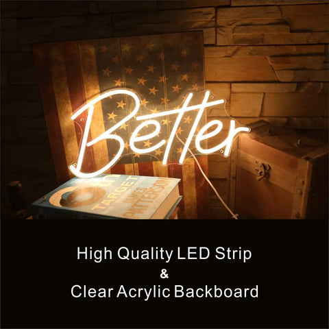 "Better" neon sign with LED strip and clear acrylic backboard, placed against a rustic wall; warm ambiance for decor.