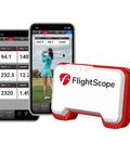 Portable Golf Launch Monitor Mevo with 3D Doppler Radar and shot data next to smartphone display showing golf metrics and video.