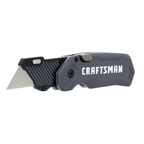 Heavy Duty Compact Folding Utility Knife Featuring Slick One Hand Push Button Opening Reversible Carry Clip Quick Blade Swaps And Tough As Nails Lifetime Guarantee For Real World Professionals side view showing sleek black and red design.