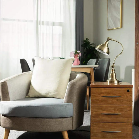 Brass Adjustable Desk Lamp With Rotary Shade Vintage Task Light on a wooden side table in a cozy living room setting