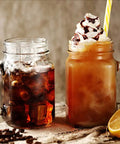 Iced coffee and cold brew in mason jars with lemons, highlighting No Mess Cold Brew Filters 100 Count Disposable Fine Mesh Bags For Concentrate.