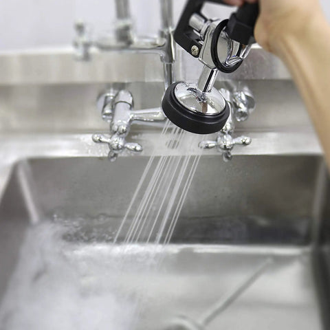Commercial Sink Sprayer Replacement Kit With Handle Grip, Pre-Rinse Faucet Spray, 1.28 GPM, in use over a kitchen sink.