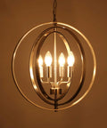 Dope Modern 4 Light Globe Chandelier In Brushed Nickel, Adjustable Height With 59in Wire And Chain, lit in a dim room