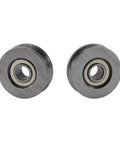 Close-up of V Groove Ball Bearing Set 20 Pcs Miniature Steel V Pulley Bearings 3x12x4mm, silver carbon steel, double shield seals.