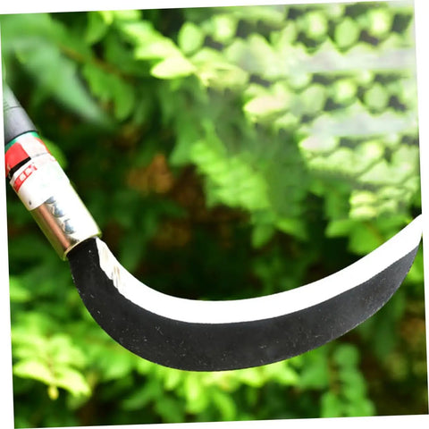 Close-up of a Manganese Steel Weeding Sickle Set Lightweight Garden Tool for Fast Grass Cutting and Weeding blade in foliage background.