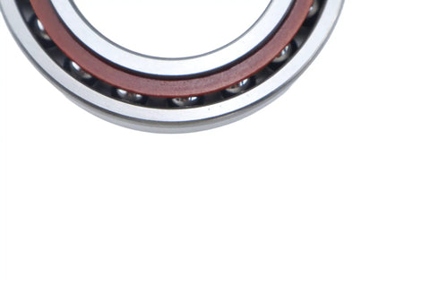 Top Shelf 7011AC Angular Contact Ball Bearing 55X90X18MM showing open design and steel ball arrangement for heavy duty applications.