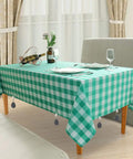 Green checkered tablecloth with No Slip Marble Tablecloth Weights With Clips, 8 Piece Grey Pendant Stone Table Cover Weights attached.