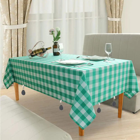 Green checkered tablecloth with No Slip Marble Tablecloth Weights With Clips, 8 Piece Grey Pendant Stone Table Cover Weights attached.