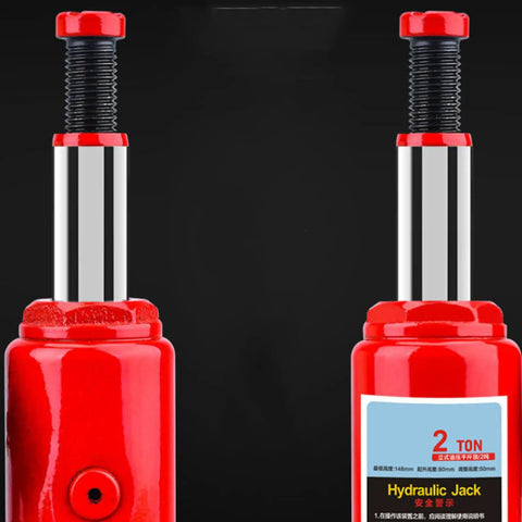 Heavy Duty Top Shelf Rock Solid Two Ton Hydraulic Bottle Jack Smooth Manual Car Lift For Garage And Shop Safe Vertical Design with red finish.