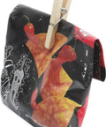 Natural Wood Clothespins 50 Pack Built Different Heavy Duty Wooden Clips holding a bag of tortilla chips.
