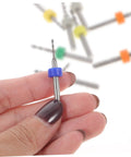 Person holding a drill bit from the 30 Piece Tungsten PCB Drill Bit Set for Hand Drill and Jewelry Making, Precision Micro Drill Bits.