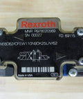 R978020569 4-way directional control valve 4WE6D62/OFEW110N9DK25L V/62 solenoid with 5-pin connector close-up