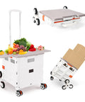 Foldable Utility Cart With Stair Climbing Wheels, Collapsible Rolling Crate With Magnetic Lid loaded with groceries, boxes.