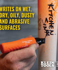 XL Chisel Tip Permanent Marker For Multi Surface Jobsite Use Black Ink That Writes On Wet Oily And Dry Surfaces With Industrial Grade Performance And A Clog Resistant Tip Skribes XL Marker in use on a pipe