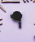Swivel Stem Caster Wheels with Brake 2set for Furniture and Bed Frames, black caster on a purple background surrounded by tools.