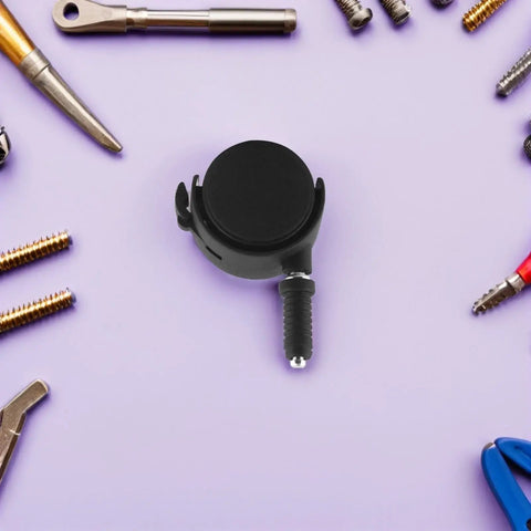Swivel Stem Caster Wheels with Brake 2set for Furniture and Bed Frames, black caster on a purple background surrounded by tools.