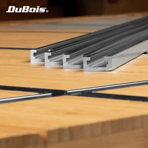 Heavy Duty Universal Aluminum T Track Four Pack With Smooth Double Cut Channels and Predrilled Mounting Holes on wood surface.