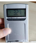 Slick Pocket Sized Surface Roughness Tester Heavy Duty Digital Gauge showing Ra value of 3.27 on display, handheld device.
