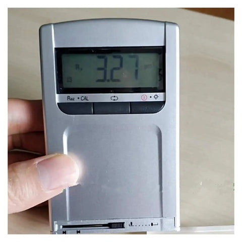 Slick Pocket Sized Surface Roughness Tester Heavy Duty Digital Gauge showing Ra value of 3.27 on display, handheld device.