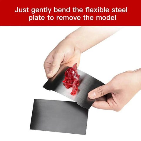 Person bending upgraded resin magnetic flexible steel plate bed 202x128mm for resin 3D printers with spring steel brushed adhesion surface.