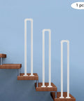 Heavy Duty U Shaped Stair Handrail With Solid Steel Wall Mount Railing Built Tough For The Daily Grind Featuring An Ultra Smooth Grip And Durable Baked Finish For Total Peace Of Mind At Home - white stair handrail mounted on wooden steps.