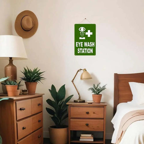 8x12 Inch Eye Wash Station Sign high visibility green background with white graphic and text in room setting, wall-mounted