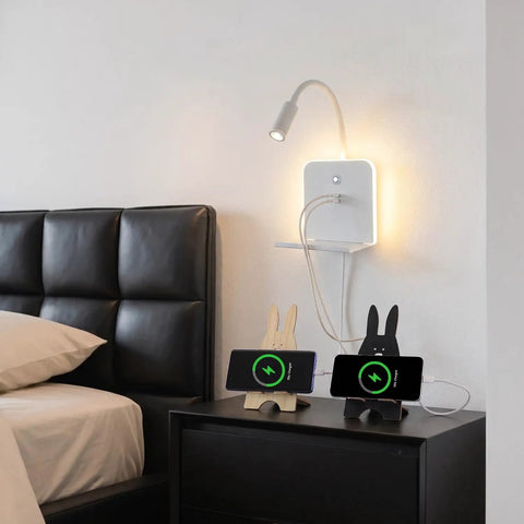 Plug-in & Hardwired LED Wall Sconce, Dimmable Wall Mount Reading Light with USB A & Type C Charging Ports, Flexible Gooseneck, Storage Shelf & Ambient Backlight, Matte White for Bedroom Bedside Hotel next to bedside with devices charging.