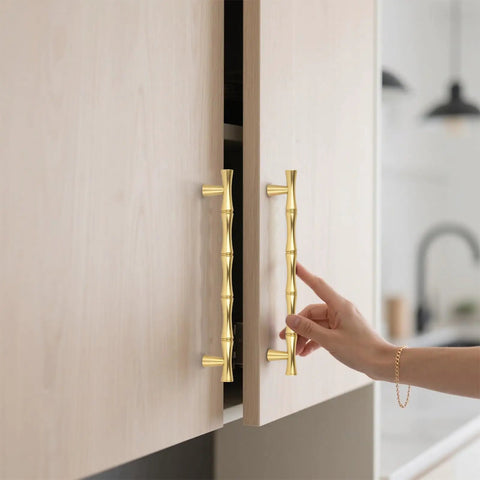 Brushed Gold Cabinet Pulls 7.5 Inch Hole Center Zinc Alloy Heavy Duty Drawer Handles 6 Pack shown on light wood cabinet